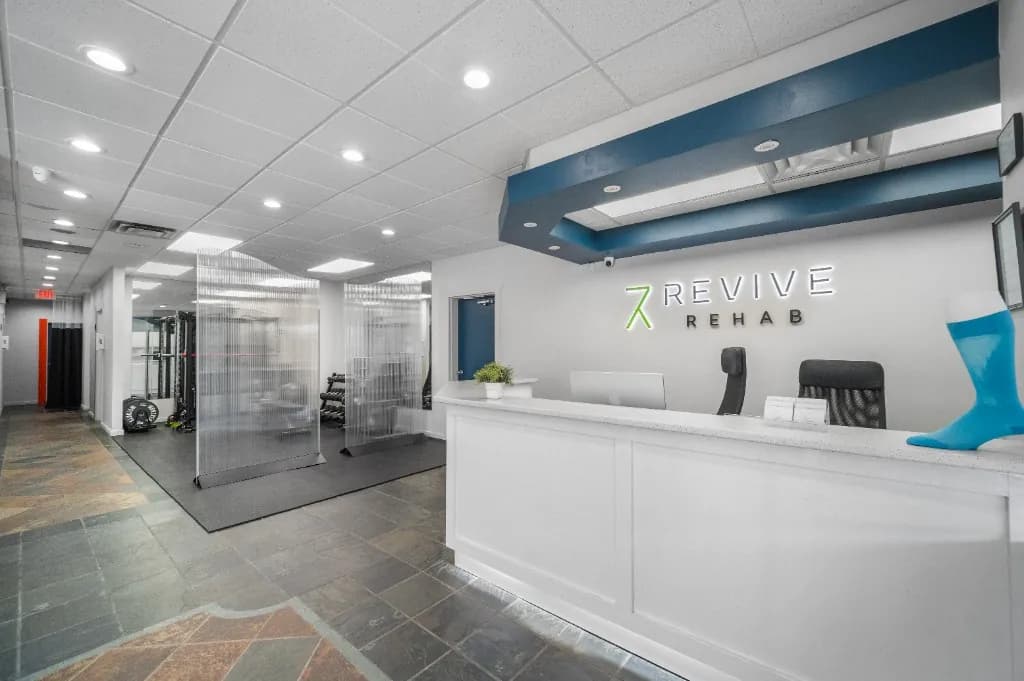 Revive Rehab Surrey Scott Road Front Reception Counter & Gym Peek